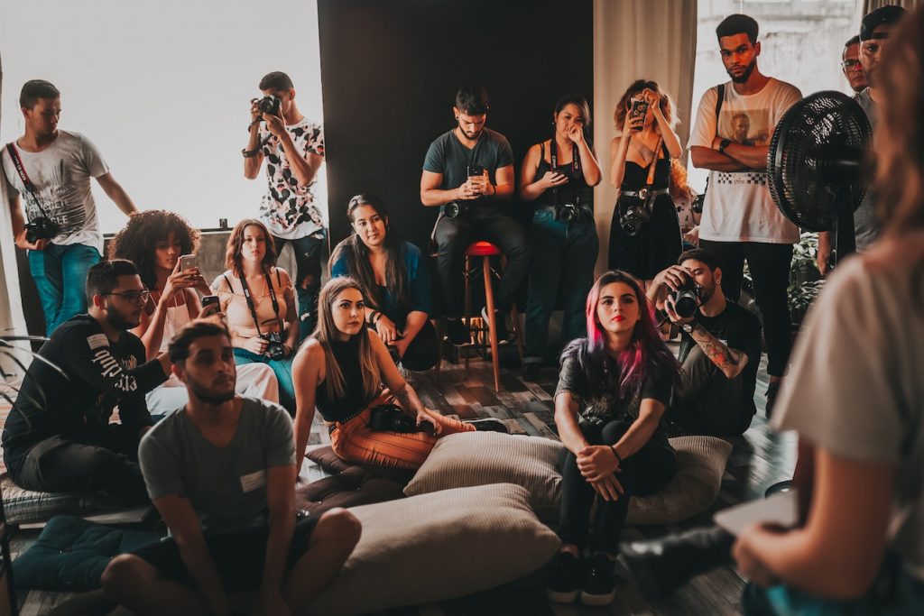 Photo by Matheus Bertelli: https://www.pexels.com/photo/young-diverse-people-gathering-in-studio-and-listening-to-speaker-3856026/